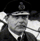 Old photograph of Riiser-Larsen, wearing an airforce cap.