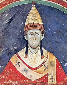 A painting of Pope Innocent III, wearing his formal robes and a tall, pointed hat.