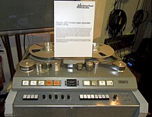 A colour image of a grey recording machine