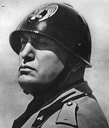 portrait of Benito Mussolini in a helmet and uniform