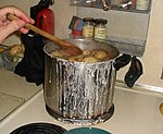 Salt potatoes being cooked in a pot