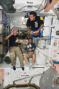 STS-134 Mark Kelly, Roberto Vittori and Greg Chamitoff during a break in the Unity node