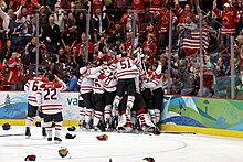 Hockey players and fans celebrating