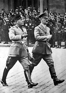 Mussolini walking with Adolf Hitler in Berlin, in military uniforms 1937