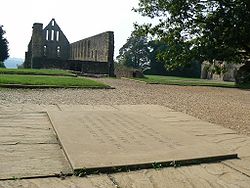 Picture of plaque at Battle Abbey, the traditional site of the High Altar of Battle Abbey founded to commemorate the victory of Duke William on 14 October 1066. The high altar was placed to mark the spot where King Harold died.