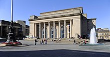 Sheffield City Hall, a Neo-classical design with a large portico and prominent pillars which were damaged when a bomb fell on the adjoining Barkers Pool during the Second World War. It is a grade II* listed building