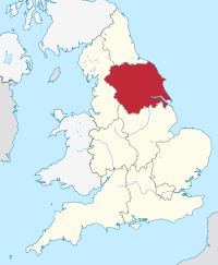 Yorkshire และ Humber โดยเน้นด้วยสีแดงบนแผนที่การเมืองสีเบจของอังกฤษ