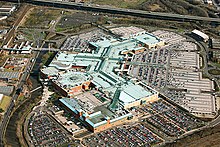 Meadowhall, a large shopping centre building on the site of the former East Hecla Steel Works