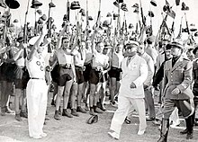 Benito Mussolini being cheered by Fascist Blackshirt youth in 1935