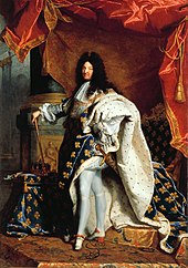 Louis XIV of France standing in plate armor and blue sash facing left holding baton