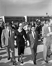 Marilyn Monroe walking from Santa Monica courthouse with her attorney, Jerry Giesler, and gossip columnist and friend, Sidney Skolsky, after divorce from Joe DiMaggio