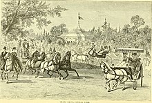People on horseback and riding in carriages in the park