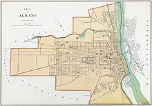 A yellowed map of the city showing streets, the Hudson River, and municipal boundaries; Albany is shaded to distinguish from neighboring towns.
