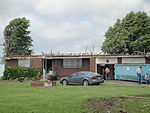 EF2 damage example -- Roof is completely removed from the house