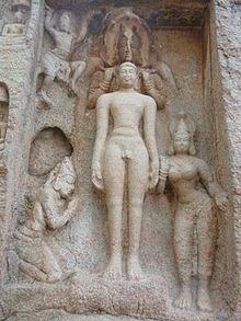 Stone relief of Parshvanatha, his companion, and other figures