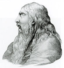 Monochrome profile of elderly George with a long white beard