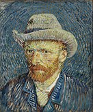 A portrait of Vincent van Gogh from the left, with a relaxed but intent look, a red beard and wearing a grey hat.