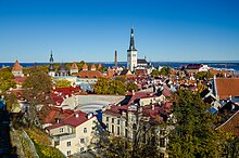 The spire of St. Olaf's Church in Tallinn looks over the city and the Gulf of Finland