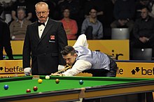 Mark Selby playing a shot