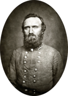 Middle aged man with large beard in military uniform