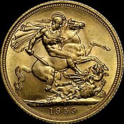 gold coin dated 1959 showing a warrior on horseback attacking a dragon on the ground