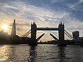 The Tower Bridge, London in the evening opening.jpg