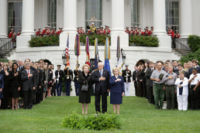 Thatcher photographed standing with Dick and Lynne Cheney