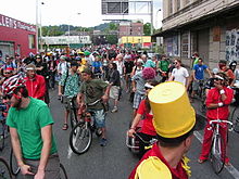 Many bicyclists with colorful clothes