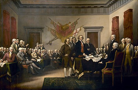 The artist's recreation of the Declaration signing with portraits of the entire Second Congress, as though all members were present. The Committee of Five are standing centered together presenting a parchment on the table.