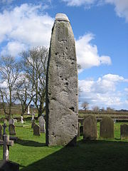 A 7.6 metre (26 foot) pillar of stone in a graveyard.