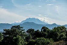 Mount Kinabalu seen from the top of a pagoda