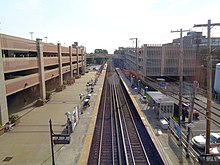 The Mineola Intermodal Center (bottom left), as seen prior to the commencement of the construction of the Main Line's third track.